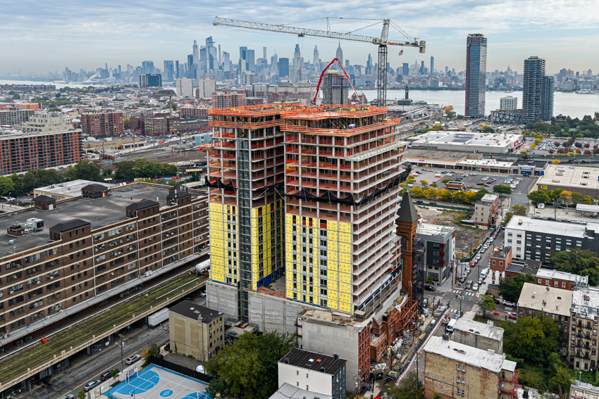 New apartment tower tops out on historic Jersey City church property